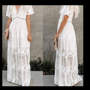 Very long white dress for maternity shoot